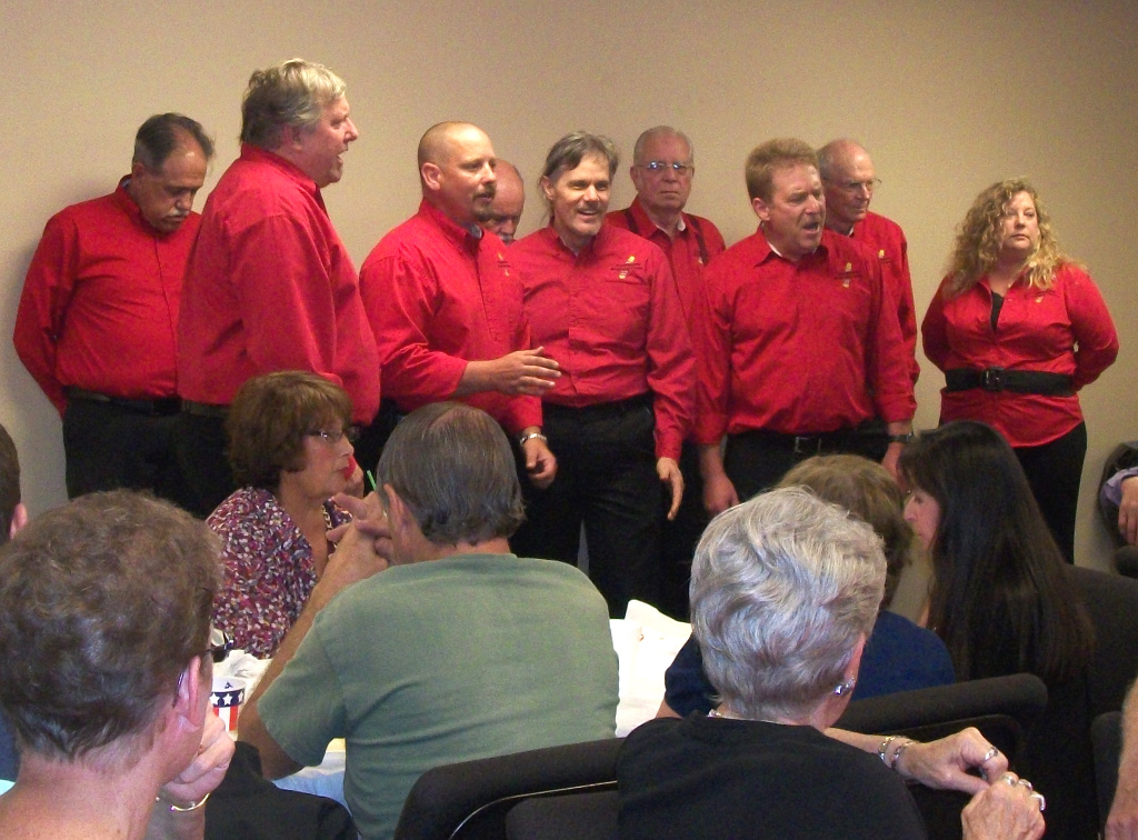 The Wyomingaires entertain guests at a holiday dinner